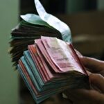 Rupiah Melemah Terhadap Dollar: Implikasi dan Prediksi